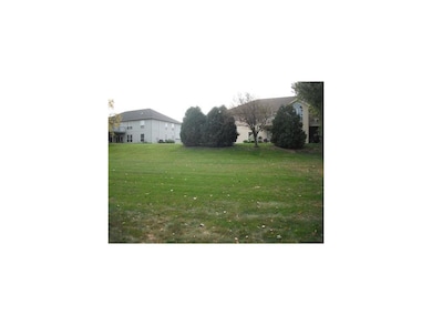 Exterior Back. Tons of green space behind the buil
