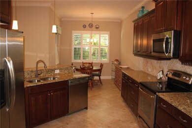 Upgraded kitchen with granite, solid wood cabinetr