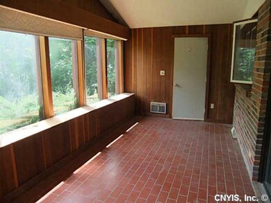 Porch - Enclosed. overlooks rear yard.
