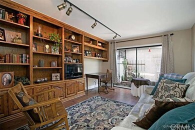Den / 3rd bedroom with built-in bookcase and slide