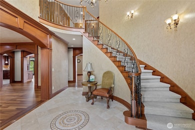 Curved staircase to the upper level