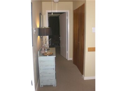 Upstairs hallway with pull down attic steps for st