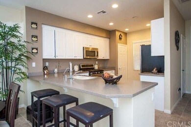 upgraded white cabinetry, stainless steel applianc