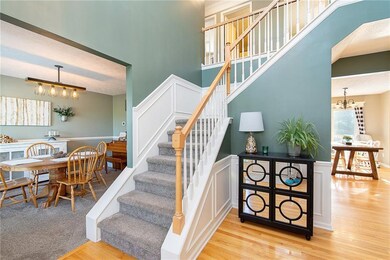 Formal dining room to the left of open foyer.