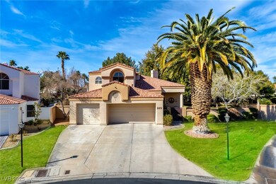 Mediterranean / spanish-style house featuring a ti