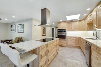 Kitchen featuring stainless steel appliances, isla