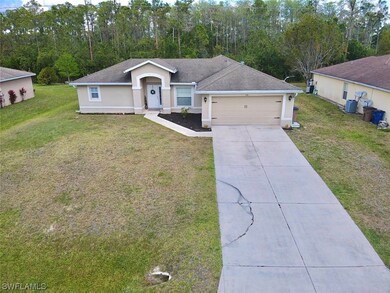156 Ridgemont Dr, Lehigh Acres, FL 33972 - photo 2