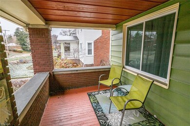 The charming front porch is the perfect spot to watch the world go by.