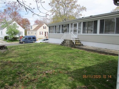 REAR VIEW WITH ENCLOSED PORCH