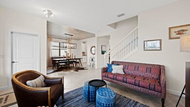 Overlooking the front yard and separate from the open layout, this living room is ideal for entertai