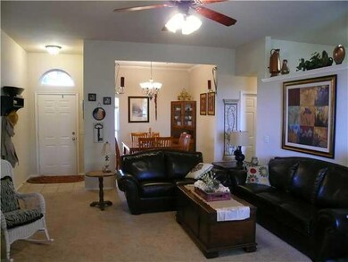 Living Room. Formal Dining or Study in the backgro