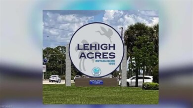 Community sign with a lawn