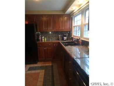 Kitchen. Cherry cabinents, granite counters, ceram