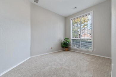 Spacious office area looking out to front yard