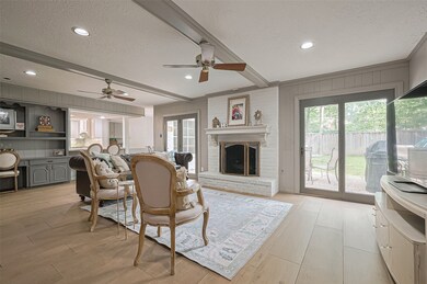 Generous size living room with a beautiful firepla