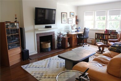 The living room is large and can accommodate sever