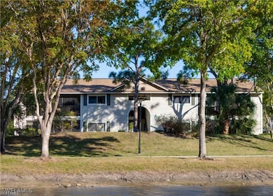 View of front of house featuring a front lawn