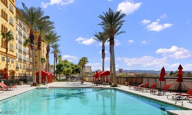 Community pool featuring a patio