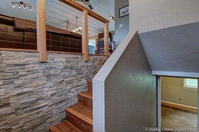 Split Entry W/Rock Wall & Wire Railing