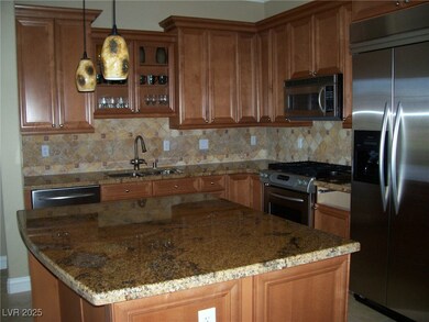 Kitchen with appliances with stainless steel finis
