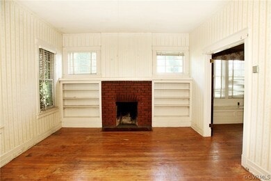 Living room with fireplace and built ins