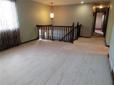 View from living room to the entry and hallway.