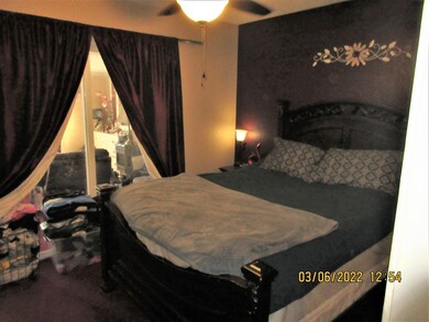 Capricorn bedroom 1 and slider to bonus