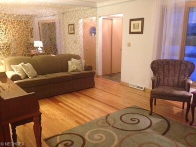 Lovely, large living room with beautifully refinis
