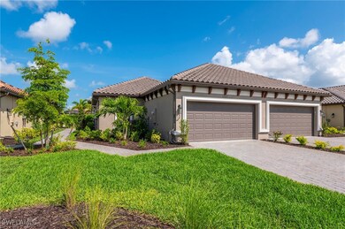 Mediterranean / spanish house featuring a front ya