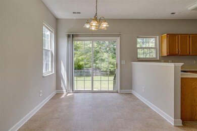 Dining area with sliding glass door that leads out