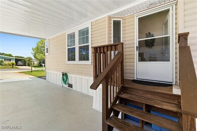 Doorway to property featuring a porch
