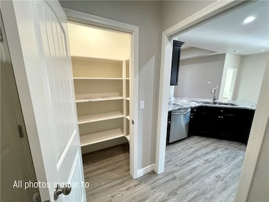 Storage area featuring a sink