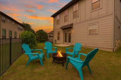 Patio terrace at dusk with a fire pit