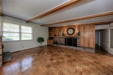 Living Room wood burning fireplace with built in c