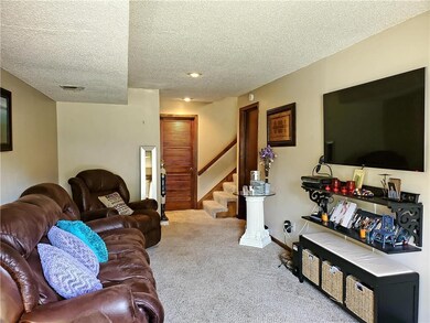 First floor family room, access to garage & storag