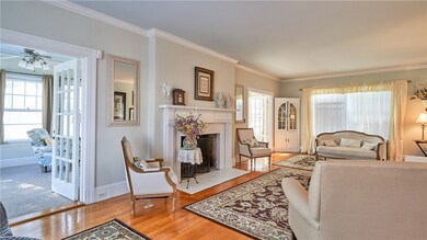 Living room opens through two sets of gorgeous fre