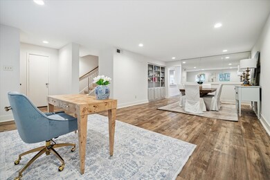 Open concept floor plan gives various options for usage. Coat closet can be seen in the entry.