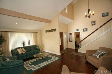 Formal living room with high ceilings and newer fl