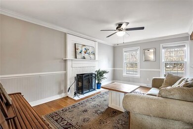 Beautiful chair rail and wainscoting accent the fa