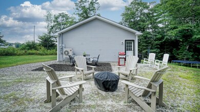 Fire pit view to side of house
