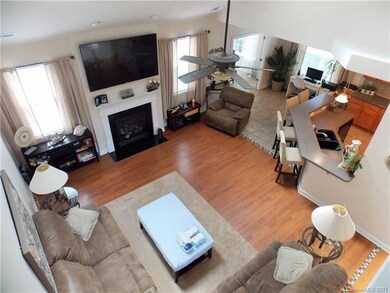 The family room is open, bright and convenient to 
