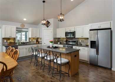 Open kitchen concept with quartz countertops and c