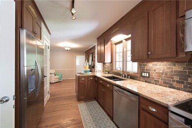 Updated kitchen with granite counters and stainles