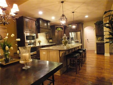 Open design makes this elegant home perfect for en