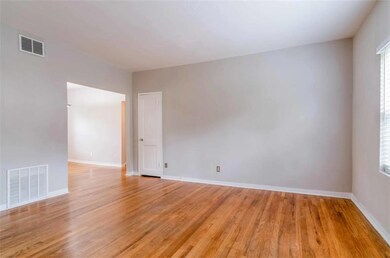 Unfurnished room with light wood-type flooring