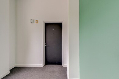 #301 is located around the corner from elevator. G