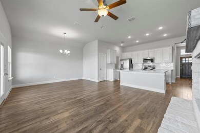 Kitchen featuring dark hardwood / wood-style floor