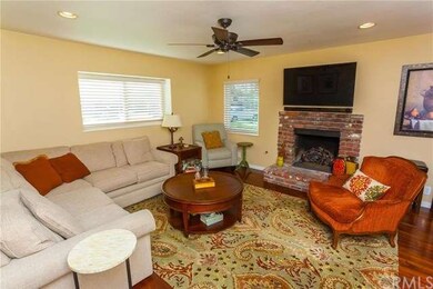 Living Room fireplace with hearth for sitting by t