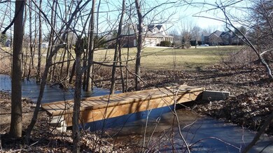 1 of 2 Bridges Crossing Creek in Back