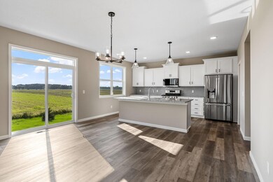 Photos are of a like(not exact) home in different location. Finishes may be different in actual home.